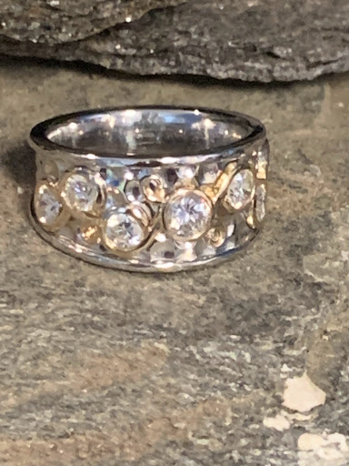 Explore rip tattoo ideas for guys, creative tattoo ideas in Newton, available at Danas Fine Jewelry, Inc.