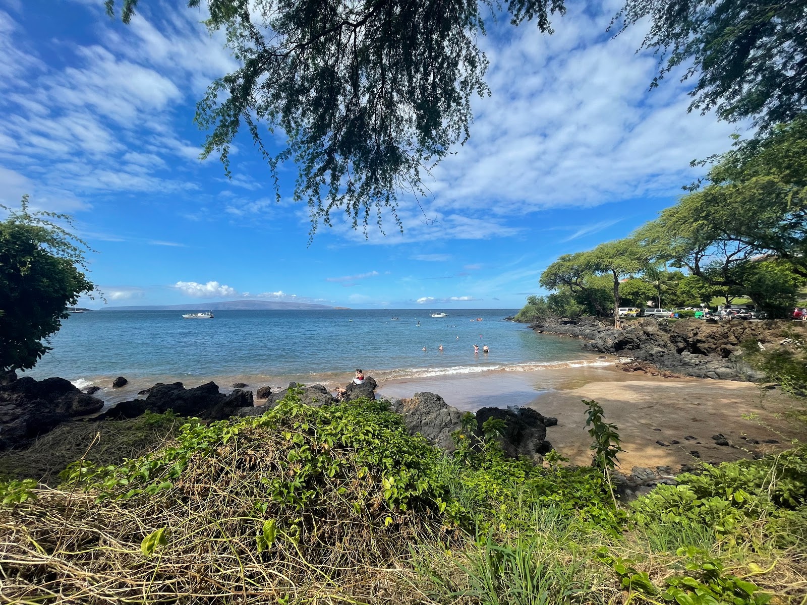 Photo of Makena Landing Beach with gray sand surface