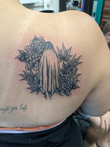 Find baby girl tattoo ideas for your next unique tattoo in Slippery Rock at Dinky Dachshund Tattoo Parlor
