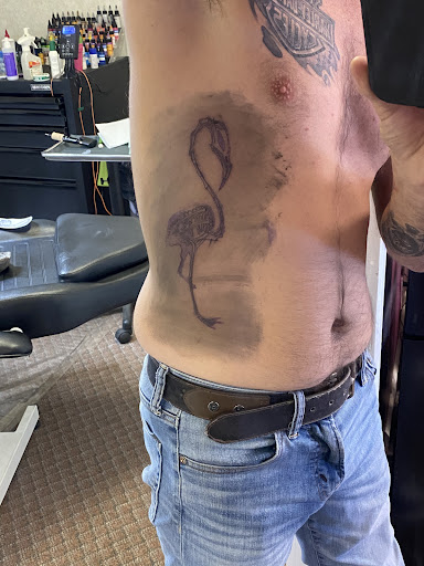 Explore dj tattoo ideas, creative tattoo ideas in Angola, available at Hoodlum Ink