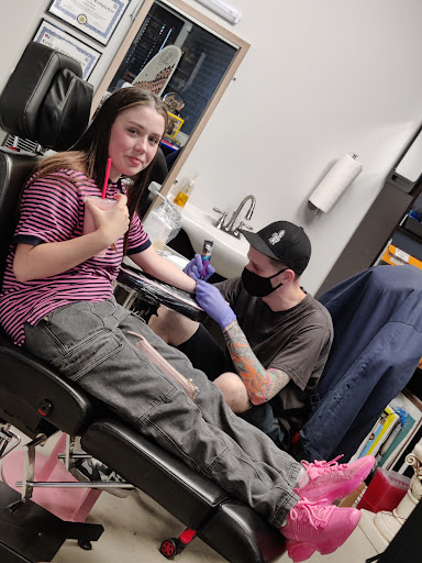 Explore small tattoo ideas for men's arms, creative tattoo ideas in Oklahoma City, available at Black Magic Tattoo