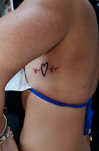 Explore little tattoo ideas for men, creative tattoo ideas in Englewood, available at The Original Big Daddy Tattoo & Body Piercing est.1997 est.1997