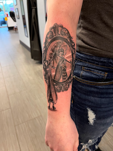 Explore ambigram tattoo ideas, creative tattoo ideas in Palm Harbor, available at Angry Owl Tattoo and Piercing