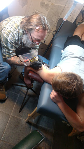 Explore rose tattoo idea, creative tattoo ideas in Omaha, available at Villains Inc