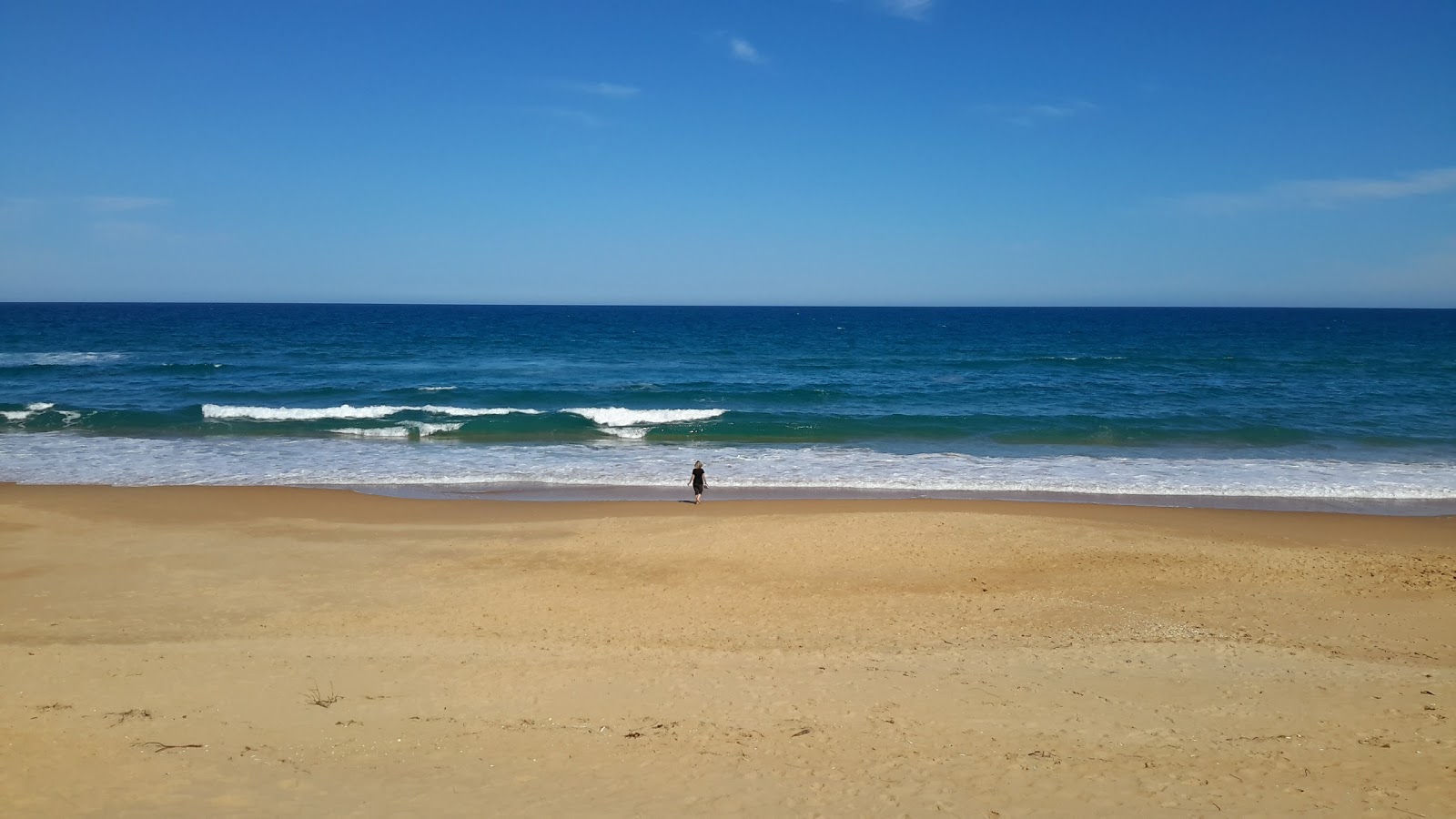 Photo de Ninety Mile Beach avec rivage droit, long