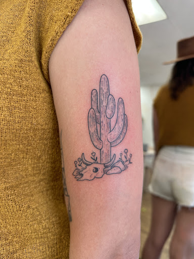 Explore cherry blossom tattoo ideas, creative tattoo ideas in Yucca Valley, available at Love Always Tattoo