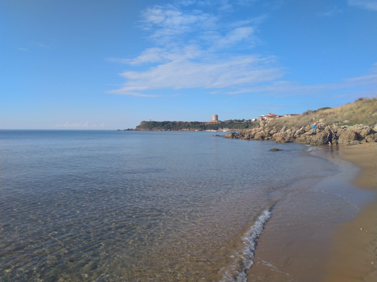 Photo de Spiaggia Rossa avec l'eau bleu de surface