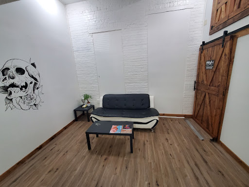 Explore front thigh tattoo ideas for women, creative tattoo ideas in Warren, available at Inkognito Tattoo