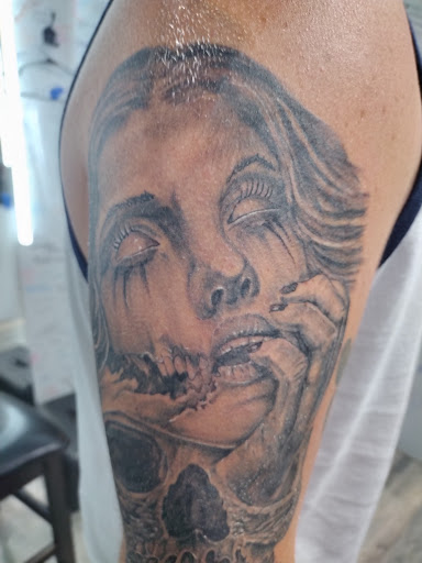 Explore october tattoo ideas for guys, creative tattoo ideas in Savannah, available at Black Lotus Tattoo and Piercing