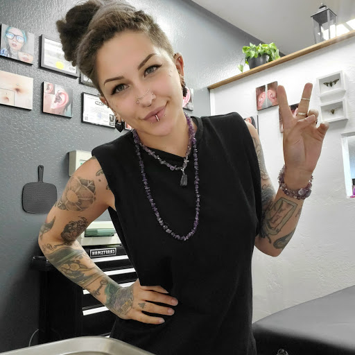 Explore tattoo ideas spine, creative tattoo ideas in Redding, available at J Varnum Body Arts Single Track Tattoo