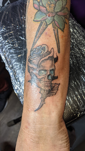 Explore trick r treat tattoo ideas, creative tattoo ideas in Cleveland, available at Divine Image Ink Tattoo and Piercing Studio