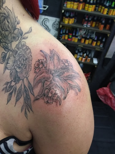 Explore basketball tattoo ideas leg, creative tattoo ideas in Panama City Beach, available at Revolution Tattoo & Body Piercing