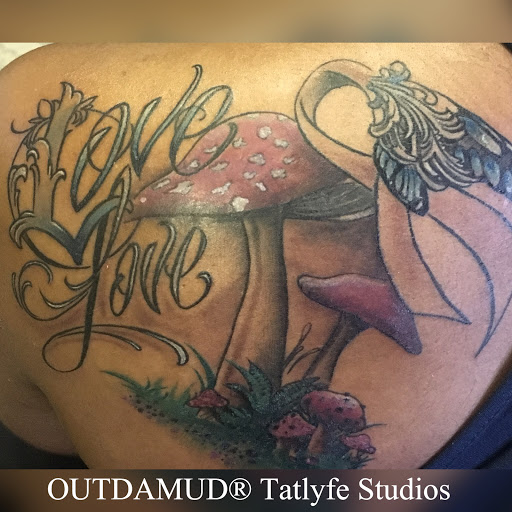 Explore tattoo ideas for women's legs, creative tattoo ideas in Savannah, available at Tatlyfe Studios