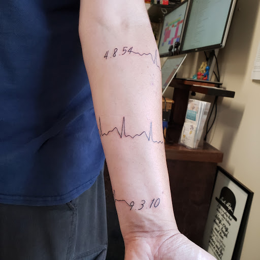 Explore uplifting tattoo ideas, creative tattoo ideas in Traverse City, available at Pinups & Needles