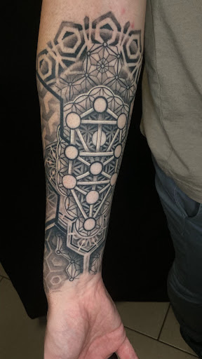 Explore cancer zodiac tattoo ideas, creative tattoo ideas in Sarasota, available at SEVEN SINS Tattoo Studio