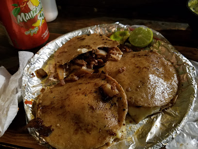 Los De Transmi ' Tacos'