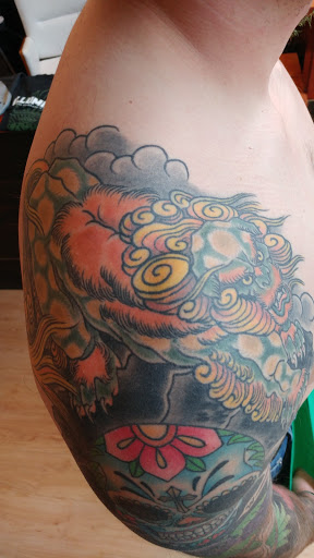 Explore praying tattoo ideas, creative tattoo ideas in Covington, available at Illuminaut Tattoo