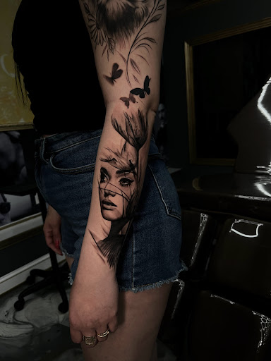 Explore surrender tattoo ideas, creative tattoo ideas in Westwood, available at Dom Astro Tattoo Company