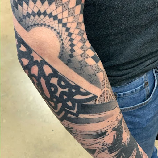 Explore record tattoo ideas, creative tattoo ideas in Maryland Heights, available at Thirteen Roses Tattoo & Aesthetics