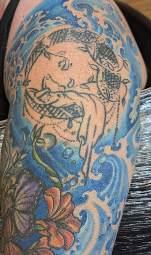 Explore feminine tattoo ideas, creative tattoo ideas in Redding, available at Caddy Daddys