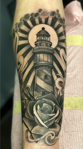 Explore tattoo arm placement ideas, creative tattoo ideas in Memphis, available at Studio 42