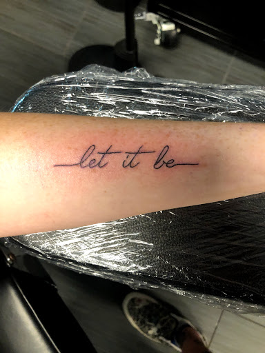 Explore daughter name tattoo ideas for dad, creative tattoo ideas in Palm Harbor, available at Angry Owl Tattoo and Piercing