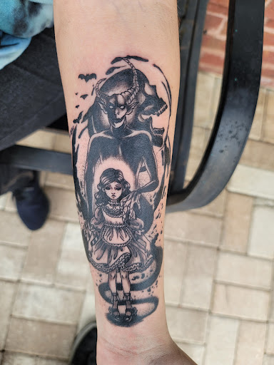 Find paradox tattoo ideas for your next unique tattoo in Buford at Wild Tribe Tattoos and Piercings