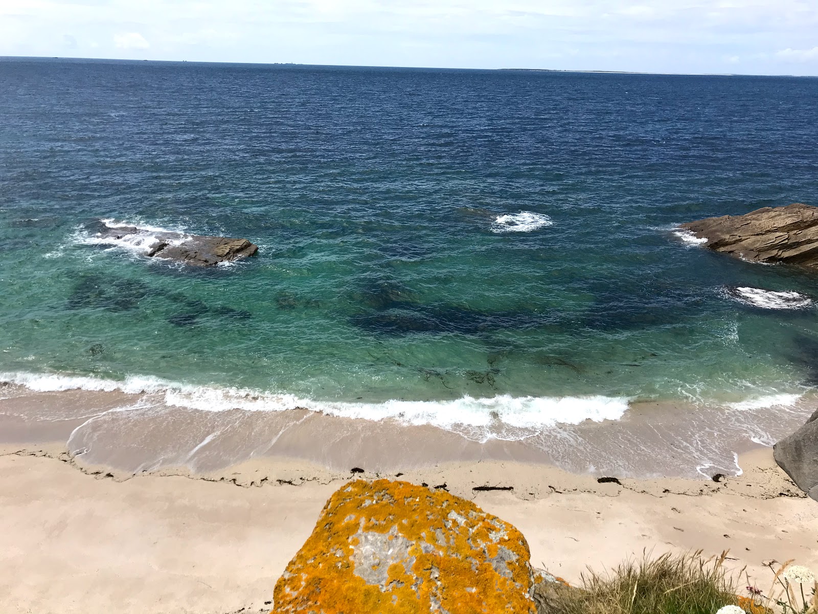 Photo de Greve Bleue avec sable blanc de surface