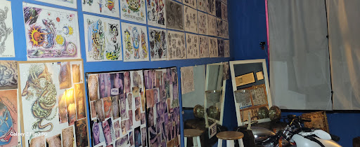 Explore dog tattoo ideas, creative tattoo ideas in Englewood, available at The Original Big Daddy Tattoo & Body Piercing est.1997 est.1997