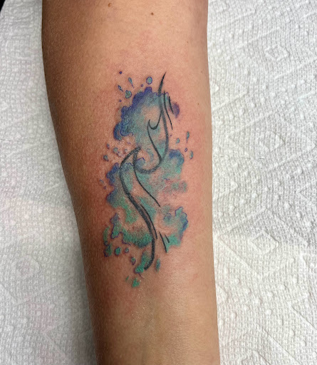 Explore chameleon tattoo ideas, creative tattoo ideas in Foley, available at Symbolic Ink Tattoo Studio