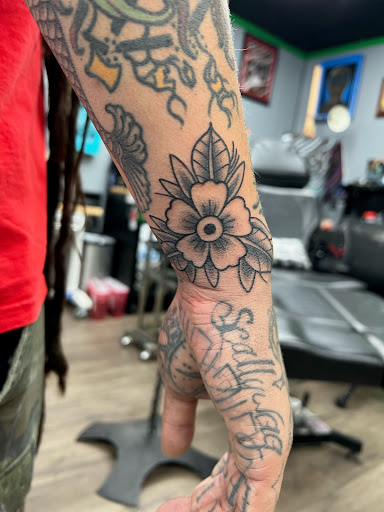 Explore autism tattoo ideas for men, creative tattoo ideas in Cheyenne, available at The T.R.I.B.E. Zoo, LLC Tattoo