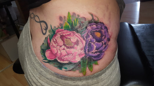 Explore tattoo ideas for men arm small, creative tattoo ideas in Peru, available at Ritual Tattoo Club