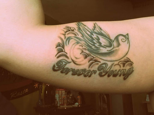 Explore heart and rose tattoo ideas, creative tattoo ideas in Walla Walla, available at Tatmandu