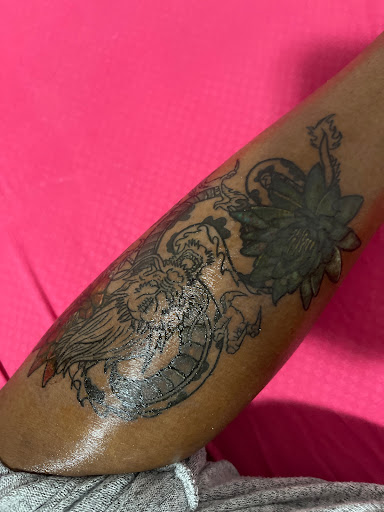 Explore wrap around wrist tattoo ideas, creative tattoo ideas in Derwood, available at Elevate Tattoo Studio (ETS)