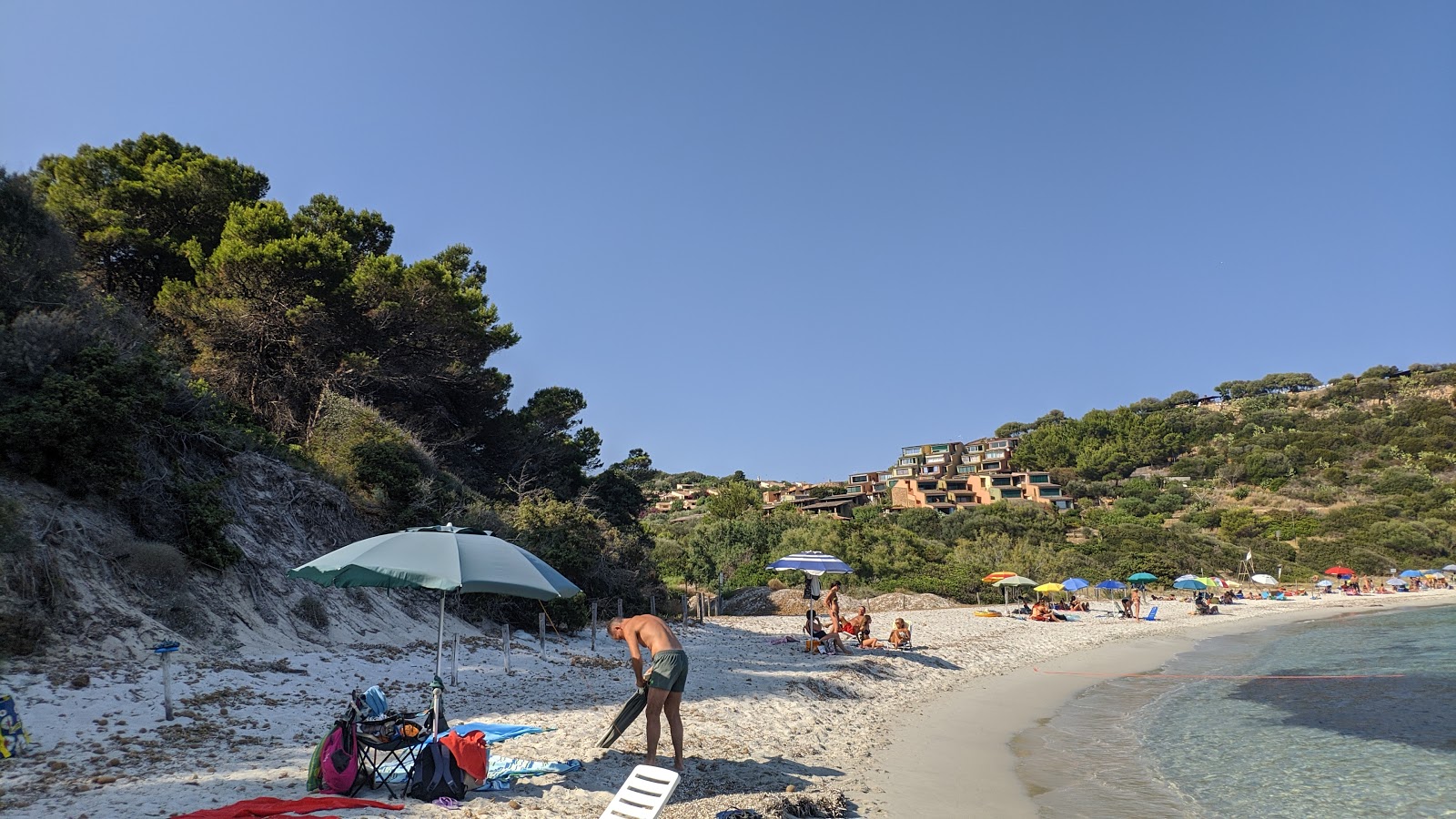 Photo of Simius Beach with partly clean level of cleanliness