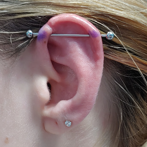 Explore working class tattoo ideas, creative tattoo ideas in San Marcos, available at Ollie the Impaler Body Piercing