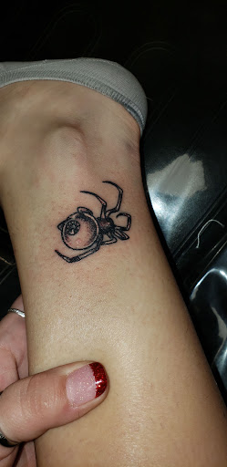Explore under breast tattoo ideas for females, creative tattoo ideas in Punxsutawney, available at DarkStar Tattoo