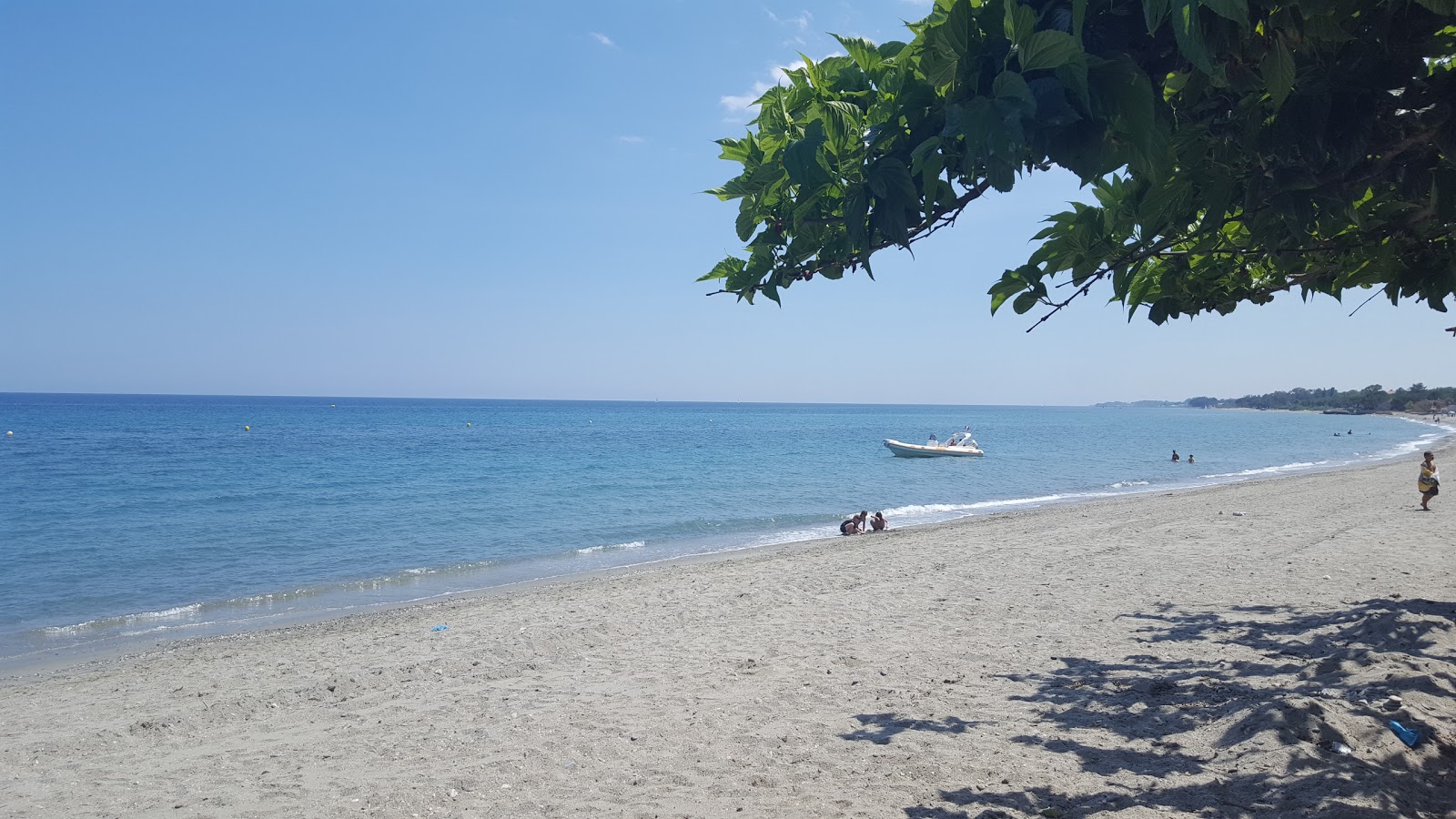 Fotografie cu Plaja Moriani cu o suprafață de nisip beige