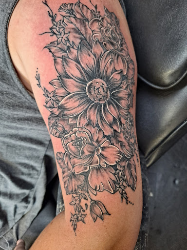 Explore cleavage tattoo ideas, creative tattoo ideas in Wilson, available at Randys Tattoos