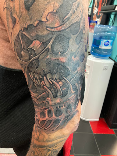 Explore tyler childers tattoo ideas, creative tattoo ideas in Largo, available at Alchemy Tattoos and Body Piercings