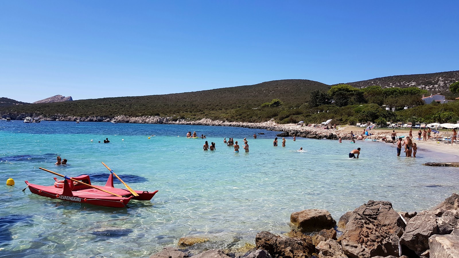 Photo of Cala Calcina with partly clean level of cleanliness