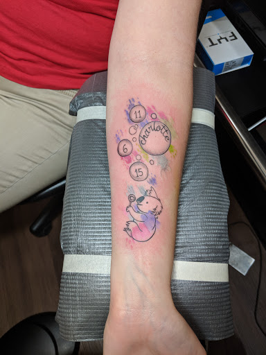 Explore upper arm men tattoo ideas, creative tattoo ideas in Richmond, available at Loose Screw Tattoo