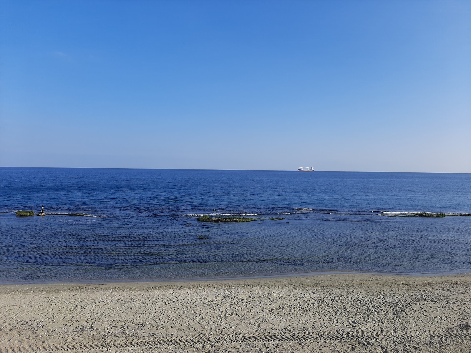 Foto von Topagac beach mit geräumiger strand