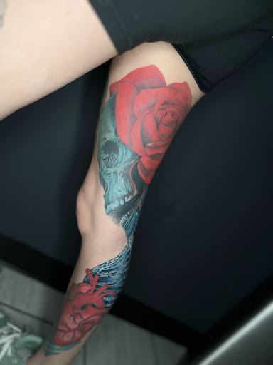 Explore violet tattoo ideas, creative tattoo ideas in Cadillac, available at Limitless Ink Tattoo Studio