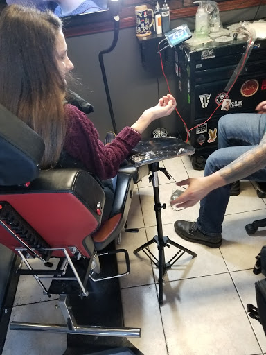 Explore camera tattoo ideas, creative tattoo ideas in Myrtle Beach, available at Elite Ink Tattoos of Myrtle Beach