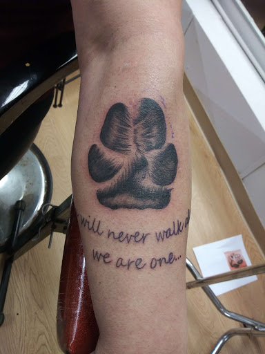 Explore trinidad tattoo ideas, creative tattoo ideas in La Crosse, available at La Crosse Tattoo