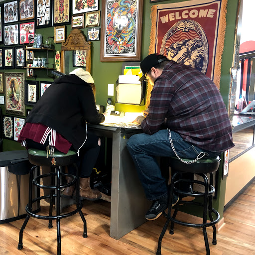 Explore travel adventure tattoo ideas, creative tattoo ideas in Lake Villa, available at Eternal Tiger Tattoo