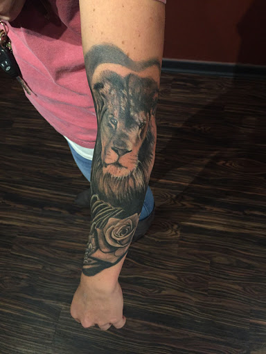 Explore outside arm tattoo ideas, creative tattoo ideas in Huntsville, available at Blacktide Tattoo Co.