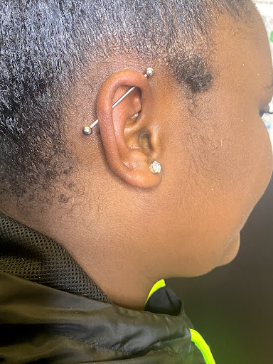 Explore flower bouquet tattoo ideas, creative tattoo ideas in Milwaukee, available at Piercing by Dani Real Ink Tattoo Studio