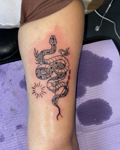 Explore jormungandr tattoo ideas, creative tattoo ideas in Altamonte Springs, available at Very Good Tattoo